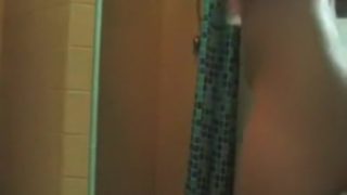 youthful woman fucking a sex-toy whilst this babe is showering