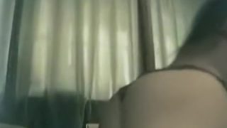 youthful woman inserts a sex-toy in her a-hole and rubs her slit