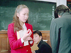 Female Teacher In Front Of The Students1982